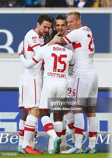 Vedad Ibisevic of Stuttgart celebrates his team's first goal with team mates during the Bundesliga match between VfB Stuttgart and FC Schalke 04 at...