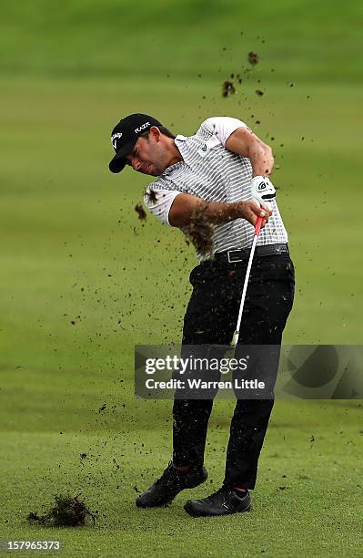 Pablo Larrazabal of Spain plays his second shot into the 17th green during the first round of The Nelson Mandela Championship presented by ISPS Handa...