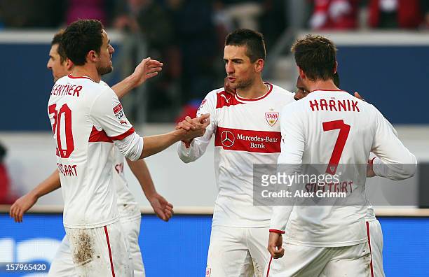 Vedad Ibisevic of Stuttgart celebrates his team's second goal with team mates during the Bundesliga match between VfB Stuttgart and FC Schalke 04 at...