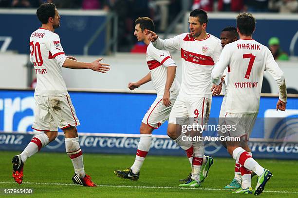 Vedad Ibisevic of Stuttgart celebrates his team's second goal with team mates during the Bundesliga match between VfB Stuttgart and FC Schalke 04 at...