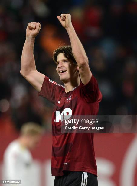 Timm Klose of Nuremberg celebrates victory during the Bundesliga match between 1. FC Nuernberg and Fortuna Duesseldorf 1895 at Easy Credit Stadium on...