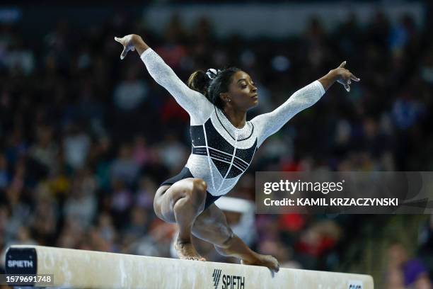 S Simone Biles, performs on the balance beam, during the 39th edition of the US Classic gymnastics competition at Now Arena in Hoffman Estates,...