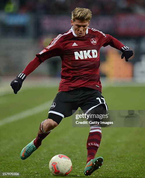 Mike Frantz of Nuremberg plays the ball during the Bundesliga match between 1. FC Nuernberg and Fortuna Duesseldorf 1895 at Easy Credit Stadium on...