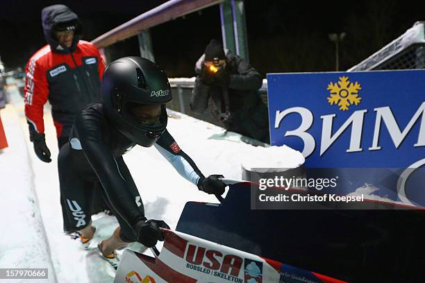 Olympic champion Tianna Madison of United States pushes the bob during the team competition of the FIBT Bob & Skeleton World Cup at Bobbahn...