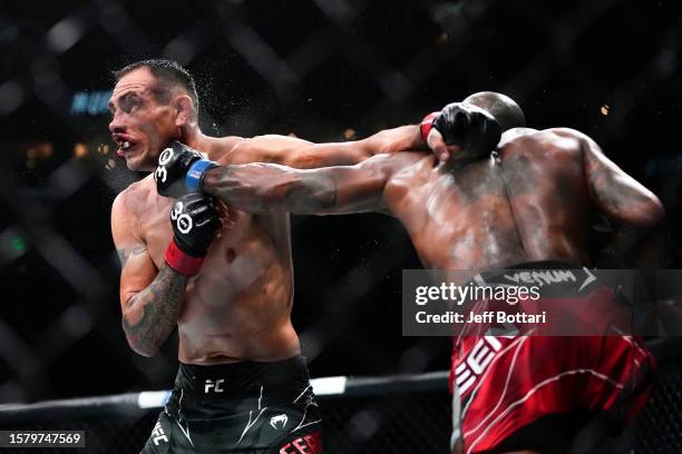 Bobby Green punches Tony Ferguson in a lightweight fight during the UFC 291 event at Delta Center on July 29, 2023 in Salt Lake City, Utah.