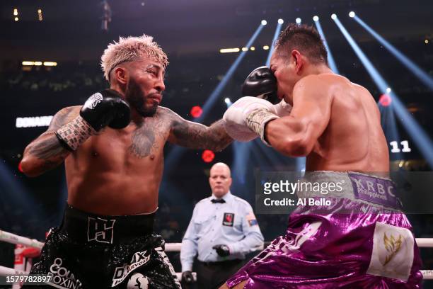 Alexandro Santiago punches Nonito Donaire during the WBC World Bantamweight Championship bout at T-Mobile Arena on July 29, 2023 in Las Vegas,...