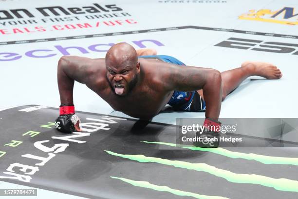 Derrick Lewis celebrates his TKO victory over Marcos Rogerio de Lima of Brazil in a heavyweight fight during the UFC 291 event at Delta Center on...