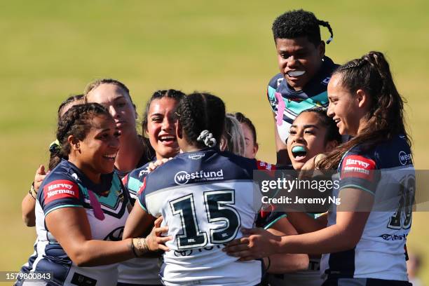 The Cowboys celebrate a try cored by Sareka Mooka of the Cowboys during the round two NRLW match between Newcastle Knights and North Queensland...