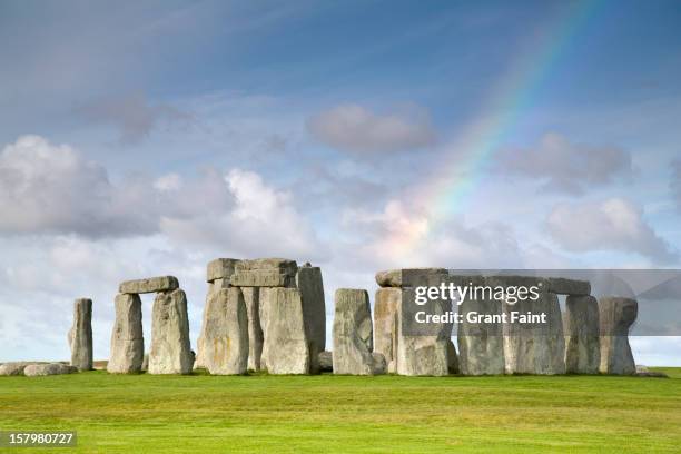 rainbow over stonehenge, salisbury plain - stonehenge stock pictures, royalty-free photos & images