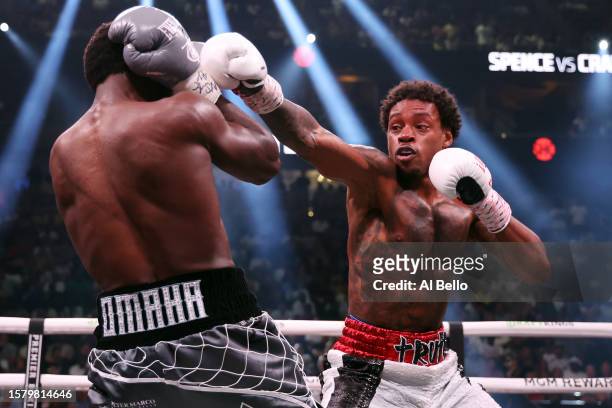 Errol Spence Jr. Punches Terence Crawford during round 2 of the World Welterweight Championship bout at T-Mobile Arena on July 29, 2023 in Las Vegas,...