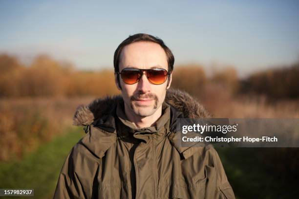 looking a bit 70's - occhiali da aviatore foto e immagini stock