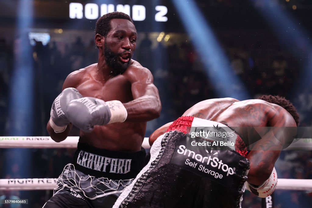Spence R&b Terence Crawford punches Errol Spence Jr. during round 2 of the World ...