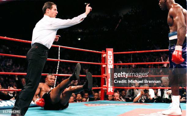 Mike Tyson v Evander Holyfield 1 in Las Vegas, Nevada, 9th November 1996. Tyson is knocked down in the sixth round. Referee Mitch Halpern counts...