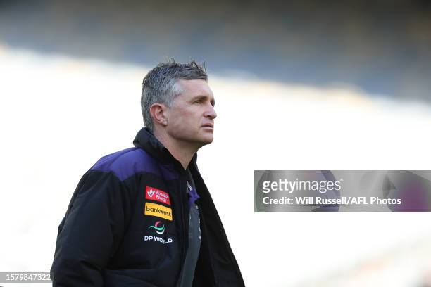 Justin Longmuir, Senior Coach of the Dockers looks on during the 2023 AFL Round 21 match between the Fremantle Dockers and the Brisbane Lions at...