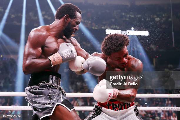 Terence Crawford punches Errol Spence Jr. During the World Welterweight Championship bout at T-Mobile Arena on July 29, 2023 in Las Vegas, Nevada.