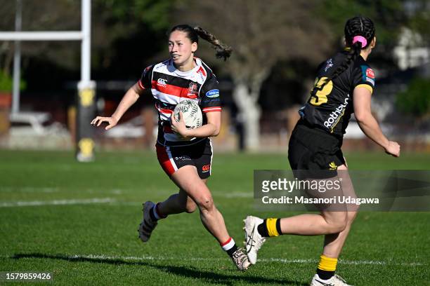 Jaymie Kolose of the Heat run with the ball during the round three Farah Palmer Cup match between Wellington and Counties Manukau at Hutt Recreation...