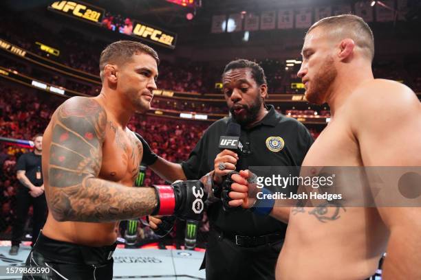 Dustin Poirier and Justin Gaethje touch gloves in a lightweight fight for the BMF belt during the UFC 291 event at Delta Center on July 29, 2023 in...