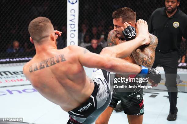 Justin Gaethje kicks Dustin Poirier in a lightweight fight for the BMF belt during the UFC 291 event at Delta Center on July 29, 2023 in Salt Lake...
