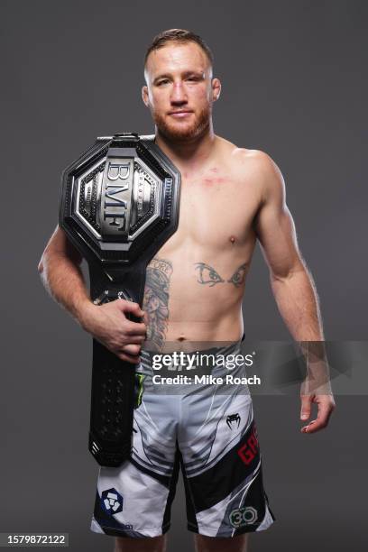 Justin Gaethje poses for a portrait backstage with the BMF belt during the UFC 291 event at Delta Center on July 29, 2023 in Salt Lake City, Utah.