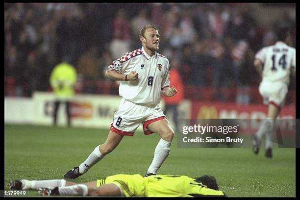 Robert Prosinecki of Croatia celebrates the Croatian winning goal during the European soccer championship match between Croatia and Turkey at the...