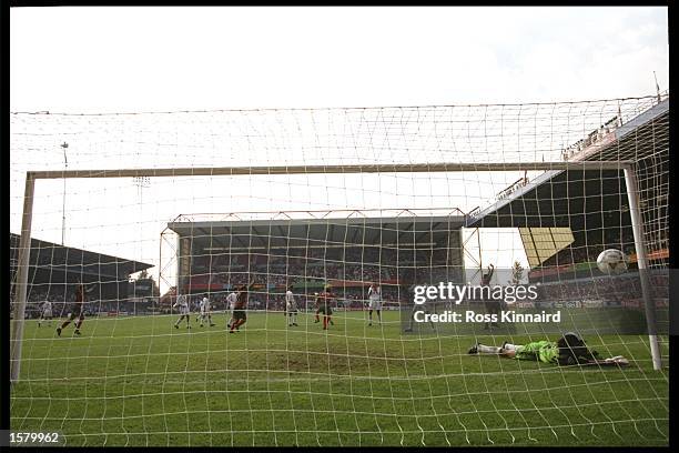 Goalkeeper Rustu Recber of Turkey is beaten by a shot from Fernando Couto of Portugal in their Group D match at the City Ground in Nottingham during...