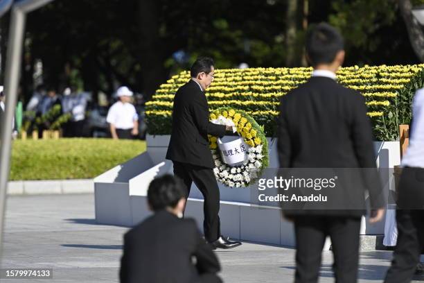 Kishida Fumio Prime Minister of Japan lays a wreath of flowers in front of the cenotaph for the victims of the world's first atomic bombing at the...