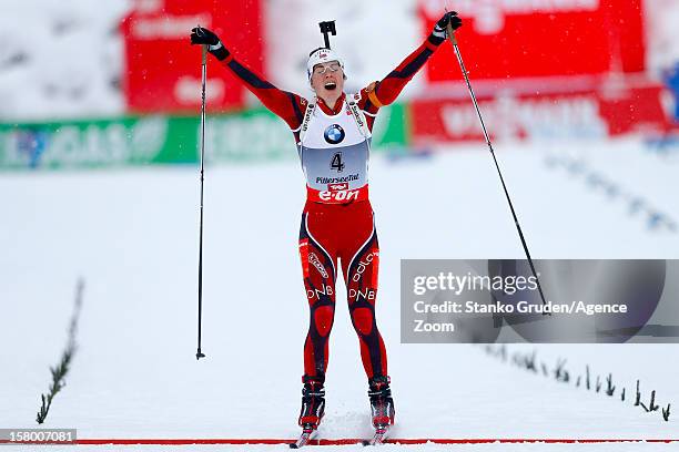 Synnoeve Solemdal of Norway takes 1st place during the IBU Biathlon World Cup Women's Pursuit on December 8, 2012 in Hochfilzen, Austria.