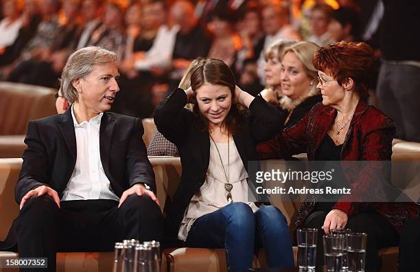 Uli Ferber with daughter Lena Maria and Helga Zellen gesture during the Andrea Berg 'Die 20 Jahre Show' at Baden Arena on December 7, 2012 in...