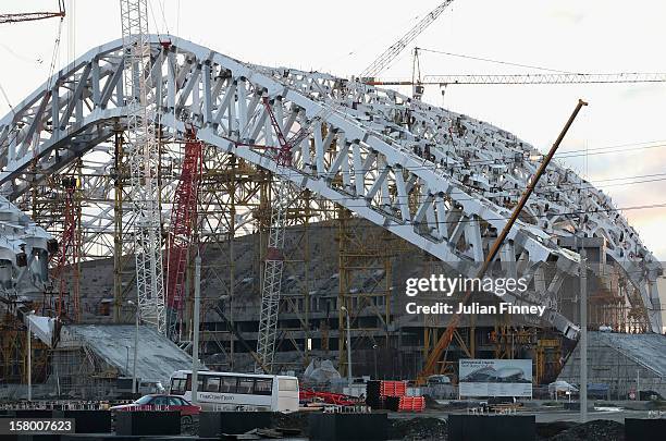 Construction on the olympic stadium continues at the coastal cluster during the Grand Prix of Figure Skating Final 2012 at the Iceberg Skating Palace...