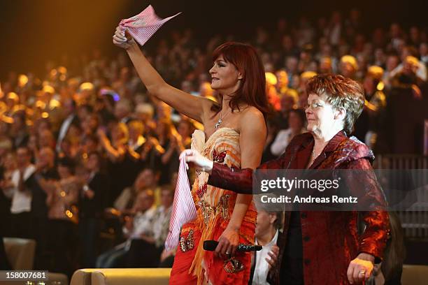 Andrea Berg and her mother Helga Zellen gesture during the Andrea Berg 'Die 20 Jahre Show' at Baden Arena on December 7, 2012 in Offenburg, Germany.