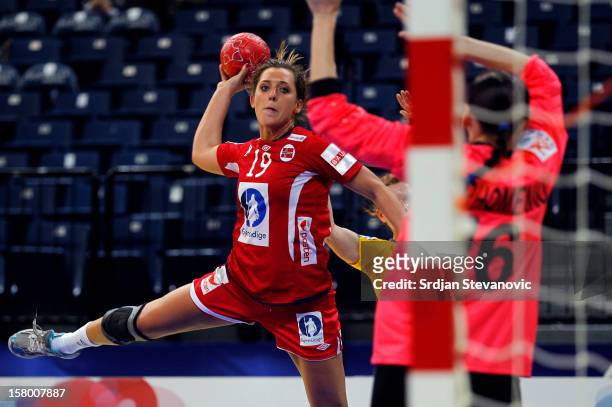 Linn Gosse of Norway scores past goalkeeper Natalya Parkhomenko of Ukraine during the Women's European Handball Championship 2012 Group A match...