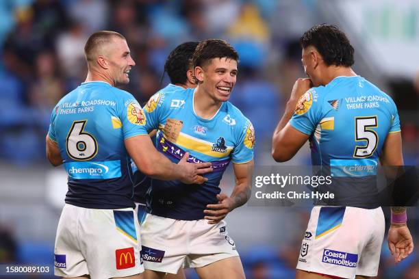 Jayden Campbell of the Titans celebrates a tryduring the round 22 NRL match between Gold Coast Titans and North Queensland Cowboys at Cbus Super...