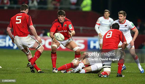 Donncha O'Callaghan of Munster passes the ball during the Heineken Cup match between Munster and Saracens at Thomond Park on December 8, 2012 in...