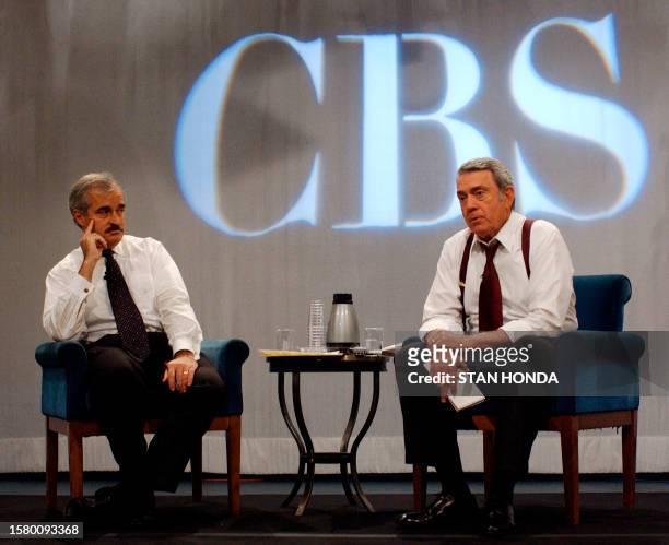 Anchor Dan Rather and CBS news division president Andrew Heyword speaks at news conference on the discovery of anthrax at CBS studios 18 October 2001...