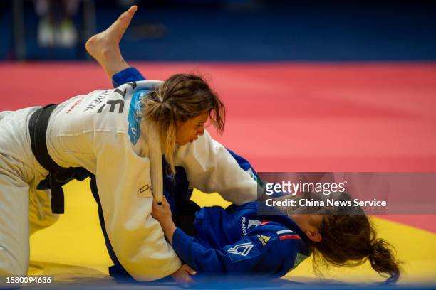Leyla Aliyeva of Azerbaijan competes against Melanie Vieu of France in the Women's -48kg Repechage Round 1 Judo match on Day 1 of 31st FISU Summer...