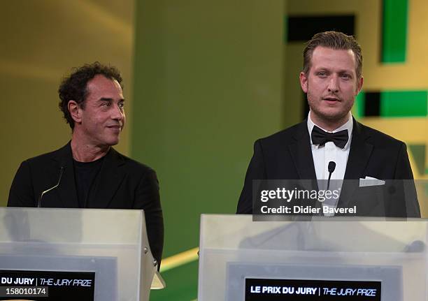 Danish film director Tobias Lindholm receives the Jury Prize award from Italian film director Matteo Garrone for his film " A Hijacking" at 12th...