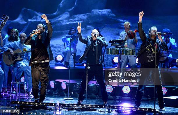 In this handout provided by the ZDF, Michi Beck, Thomas D and Smudo perform at 'Wetten dass..?' From Freiburg on December 8, 2012 in Freiburg im...