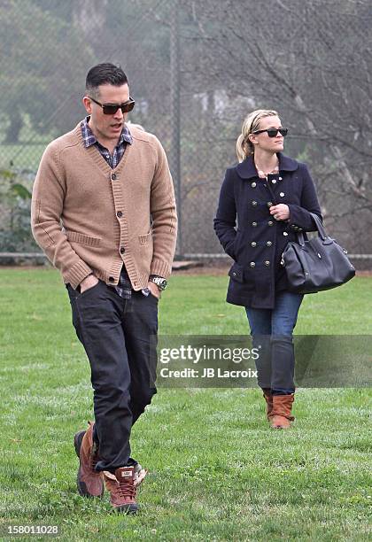Jim Toth and Reese Witherspoon attend a soccer game in Pacific Palisades on December 8, 2012 in Los Angeles, California.
