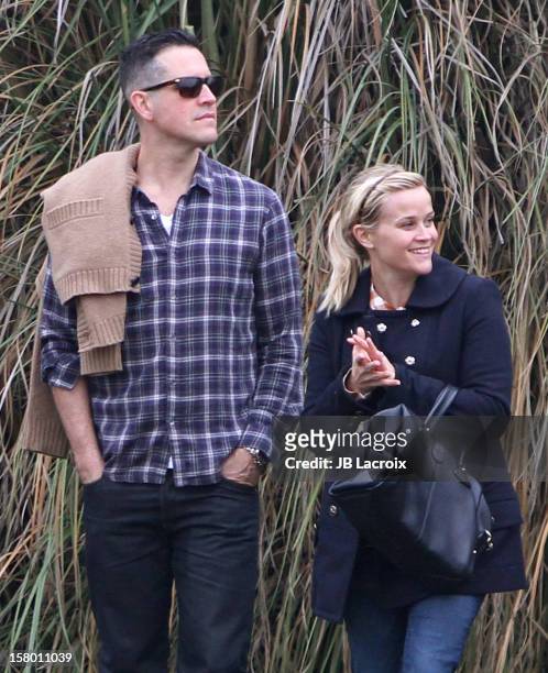 Jim Toth and Reese Witherspoon attend a soccer game in Pacific Palisades on December 8, 2012 in Los Angeles, California.
