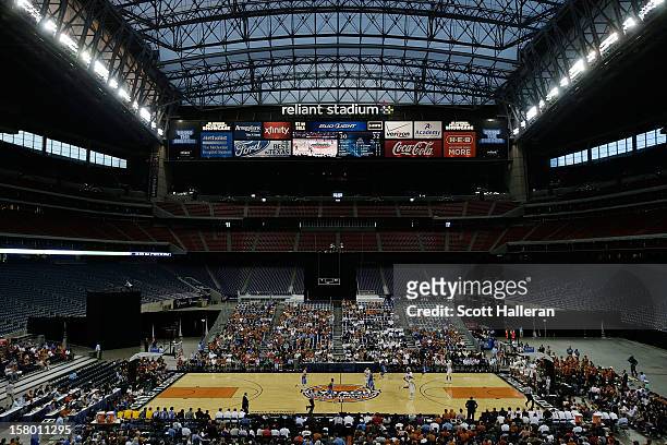Fans watch the first half action between the UCLA Bruins and the Texas Longhorns during the MD Anderson Proton Therapy Showcase at Reliant Stadium on...