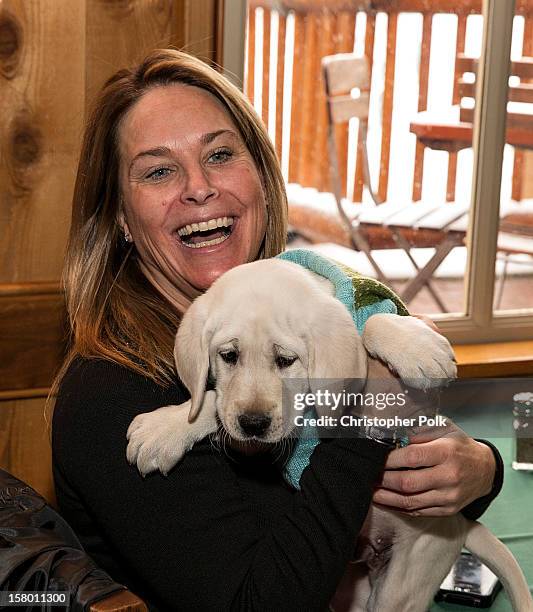 Olympic Ski team member Heidi Voelker and Elmo attend the Deer Valley Celebrity Skifest at Deer Valley Resort on December 8, 2012 in Park City, Utah.