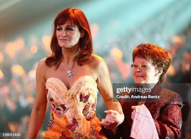 Andrea Berg and her mother Helga Zellen smile during the Andrea Berg 'Die 20 Jahre Show' at Baden Arena on December 7, 2012 in Offenburg, Germany.