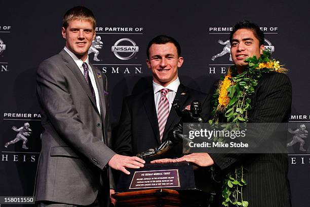 Heisman finalists quarterback Collin Klein of the Kansas State Wildcats, quarterback Johnny Manziel of the Texas A&M University Aggies and linebacker...