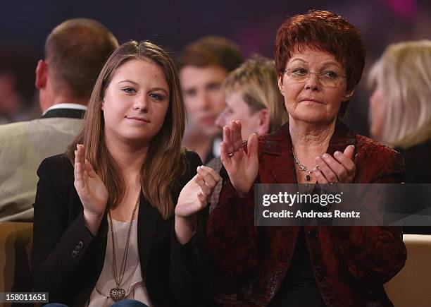 Lena Maria Ferber and Helga Zellen gesture during the Andrea Berg 'Die 20 Jahre Show' at Baden Arena on December 7, 2012 in Offenburg, Germany.