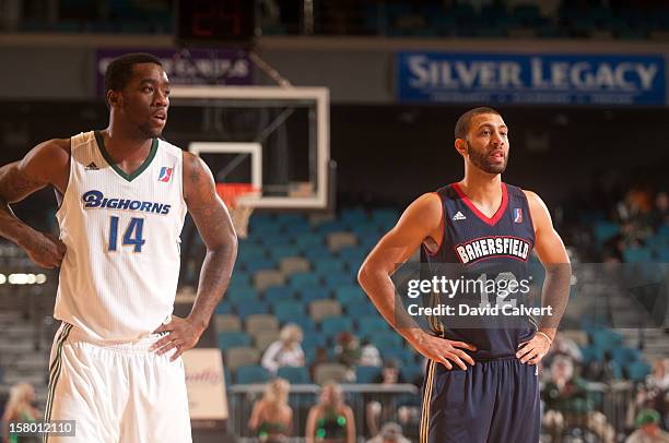 Tony Wroten of the Reno Bighorns and Kendall Hunter of the Bakersfield Jam during a free throw on December 7, 2012 at the Reno Events Center in Reno,...