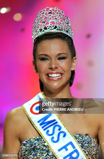 Miss Bourgogne Marine Lorphelin reacts after being crowned Miss France 2013 during the 66th edition of the beauty contest in the central city of...
