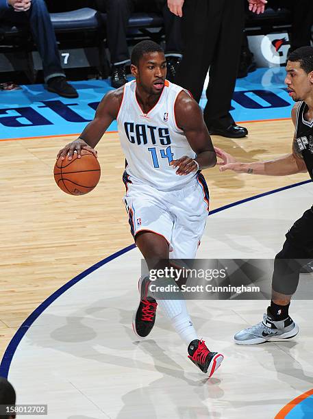 Michael Kidd-Gilchrist of the Charlotte Bobcats drives to the basket against the San Antonio Spurs at Time Warner Cable Arena on December 8, 2012 in...