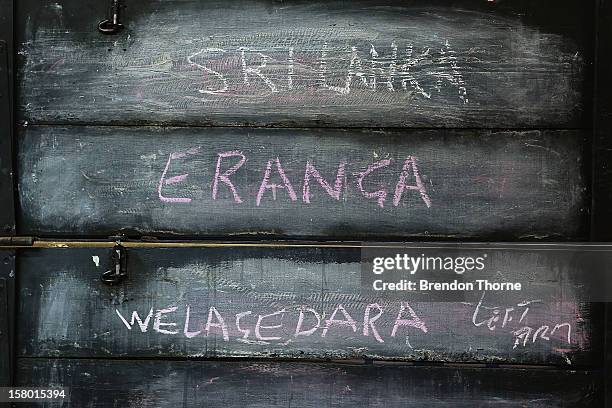 Players names are displayed inside The Jack Fingleton Scoreboard during an international tour match between the Chairman's XI and Sri Lanka at Manuka...