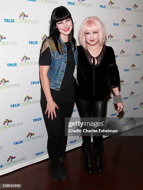 Sleigh Bells' Alexis Krauss and Cyndi Lauper arrive at The Beacon Theatre on December 8, 2012 in New York City.