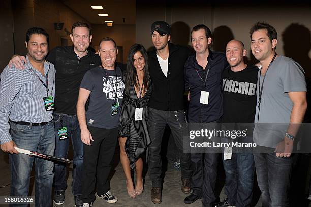 Enrique Iglesias poses backstage at the Y100's Jingle Ball 2012 at the BB&T Center on December 8, 2012 in Miami.